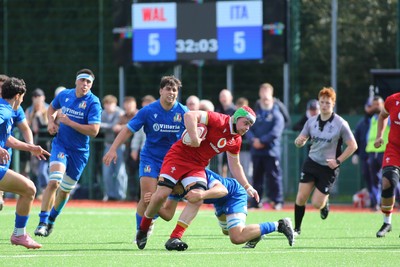 140326 - Wales U18 v Italy U18 - Alfie Prygodzicz of Wales is tackled by Pietro Colla of Italy