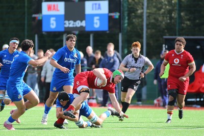 140326 - Wales U18 v Italy U18 - Alfie Prygodzicz of Wales is tackled by Pietro Colla of Italy