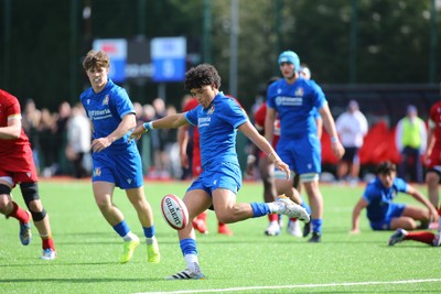 140326 - Wales U18 v Italy U18 - elson Oyekan Misantoni of Italy clears the ball to touch