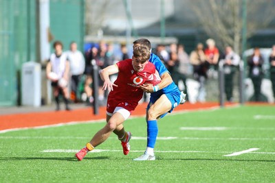 140326 - Wales U18 v Italy U18 - Harvey Bryant of Wales is tackled by Diego Ferrazzi of Italy