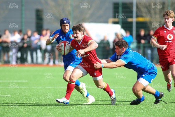 140326 - Wales U18 v Italy U18 - Alfie Luger of Wales is tackled by Pietro Colla of Italy