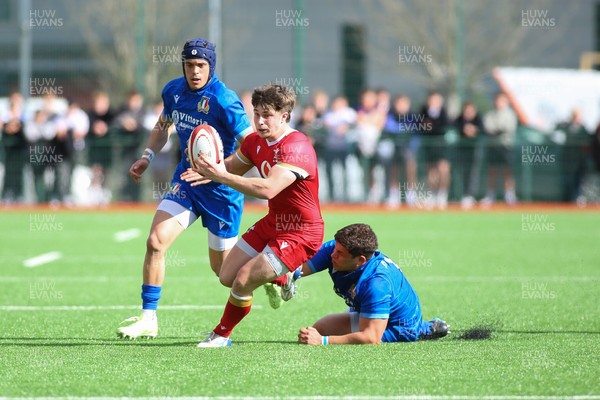 140326 - Wales U18 v Italy U18 - Alfie Luger of Wales is tackled by Pietro Colla of Italy