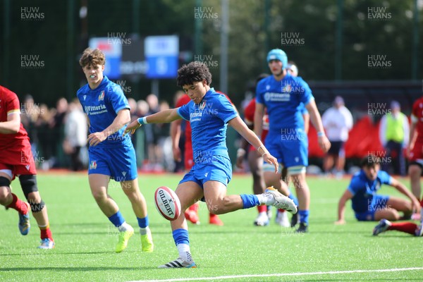 140326 - Wales U18 v Italy U18 - elson Oyekan Misantoni of Italy clears the ball to touch