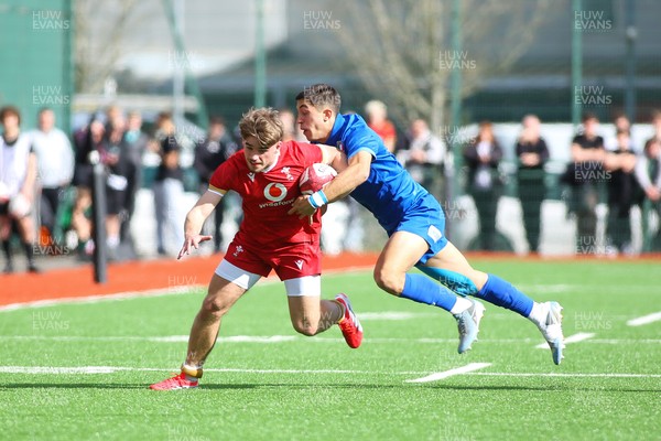140326 - Wales U18 v Italy U18 - Harvey Bryant of Wales is tackled by Diego Ferrazzi of Italy