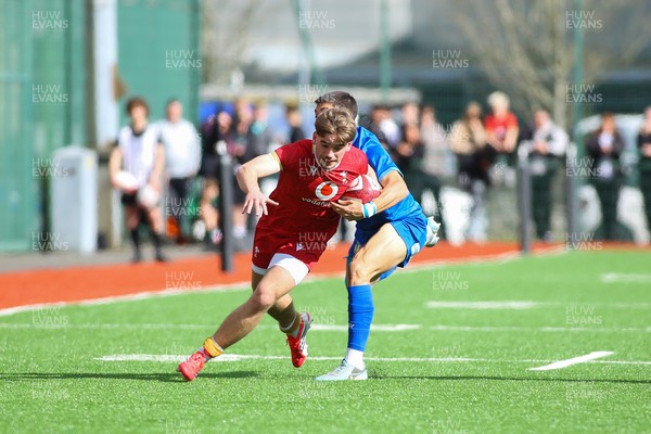 140326 - Wales U18 v Italy U18 - Harvey Bryant of Wales is tackled by Diego Ferrazzi of Italy