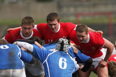 22.03.09 Wales vs. Italy. Under 18's 6 Nations. (L-R)Rhodri Jones, Ieuan Daves & Rowan Jenkins set themselves to scrummage. 