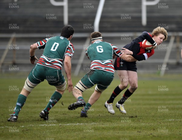 120213 - Wales U18 v Leicester Tigers Academy -   Angus O'Brien of Wales is tackled by Charlie Beckett of Leicester 