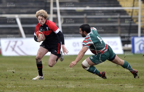 120213 - Wales U18 v Leicester Tigers Academy -   Angus O'Brien of Wales breaks with the ball