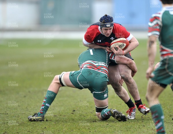 120213 - Wales U18 v Leicester Tigers Academy -   Ryan Elias of Wales is tackled by Arthur Iturria of Leicester Academy