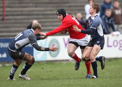 16.03.08 ..  Wales U18 v Scotland U18, Aberavon -  Wales' Adam Hughes is brought down 