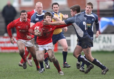16.03.08 ..  Wales U18 v Scotland U18, Aberavon -  Wales' Gareth Davies tries to hold off Alun Walker 