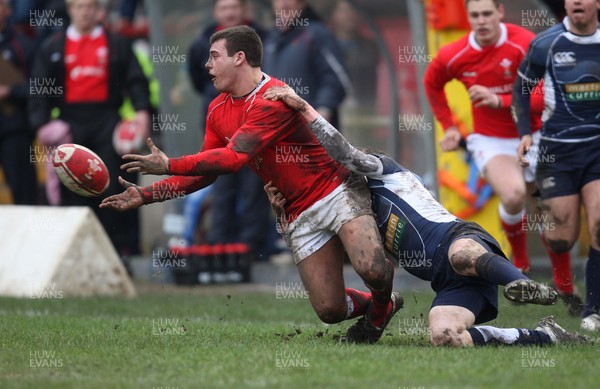 16.03.08 ..  Wales U18 v Scotland U18, Aberavon -  Wales' Rhys Jenkins makes the ball available as he is tackled 