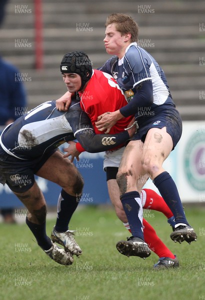 16.03.08 ..  Wales U18 v Scotland U18, Aberavon -  Wales' Adam Hughes is brought down 