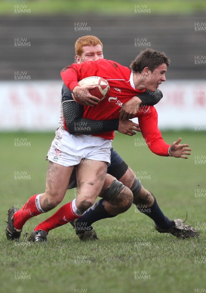 16.03.08 ..  Wales U18 v Scotland U18, Aberavon -  Wales' Rhys Downes is tackled by Robert Harley 