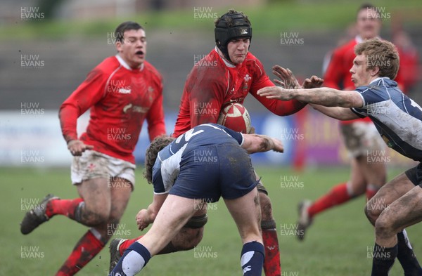 16.03.08 ..  Wales U18 v Scotland U18, Aberavon -  Wales' James Thomas is tackled by Scotlands Ross Sutherland and Alex Blair 