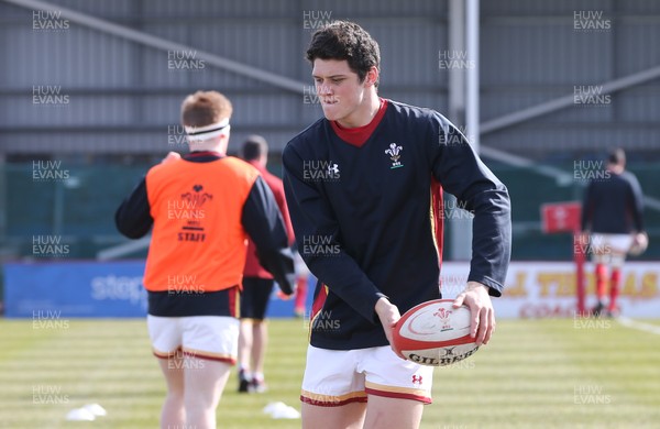 250316 - Wales U18 v Scotland U18, U18 International Series - Jim Botham of Wales, grandson of Sir Ian Botham warms up ahead of his debut match for the Wales U18 team against Scotland