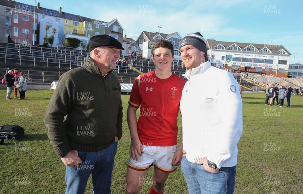 250316 - Wales U18 v Scotland U18, U18 International Series - Jim Botham of Wales with his father Liam Botham and grandfather Sir Ian Botham after he made his debut for Wales U18s against Scotland