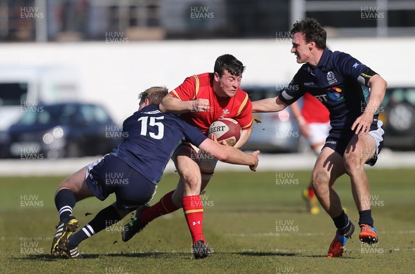 250316 - Wales U18 v Scotland U18, U18 International Series - Ryan Conbeer of Wales takes on Stafford McDowell of Scotland