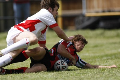 13.06.09 Wales U18's v England Lionhearts U18's The Old Parish, Maesteg -  Alex Webber dives over under pressure from Carien Clement but his try is ruled out for a previous infringement. 