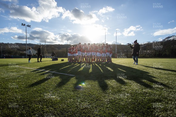 030324 - Wales U18s v Scotland U18s - Friendly - Wales team huddle at full time
