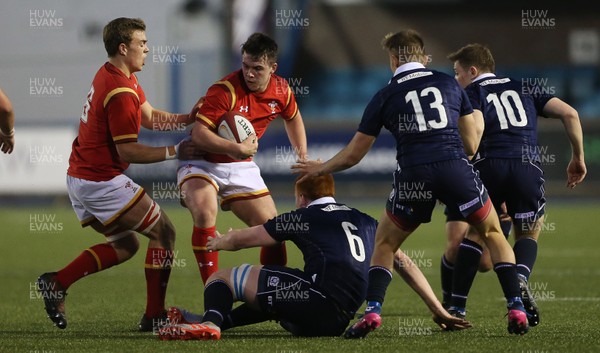 080417 - Wales U18s v Scotland U18s - Under 18 International Series - Callum Carson of Wales is tackled by Jack McLean of Scotland