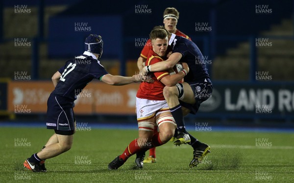 080417 - Wales U18s v Scotland U18s - Under 18 International Series - Cian Lewis-Hughes of Wales is tackled by Cameron Henderson of Scotland