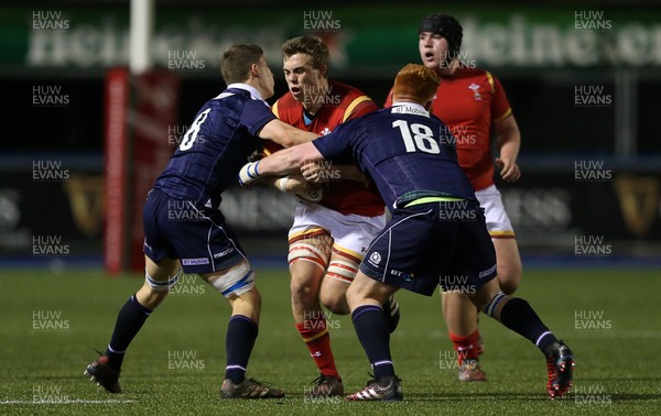 080417 - Wales U18s v Scotland U18s - Under 18 International Series - Daniel Owen of Wales is tackled by Rory Darge and Dan York of Scotland