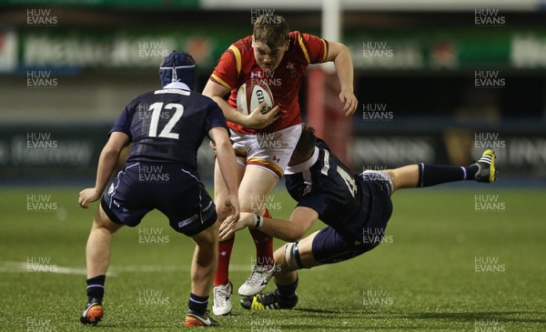 080417 - Wales U18s v Scotland U18s - Under 18 International Series - Rhys Davies of Wales is tackled by Cameron Henderson of Scotland