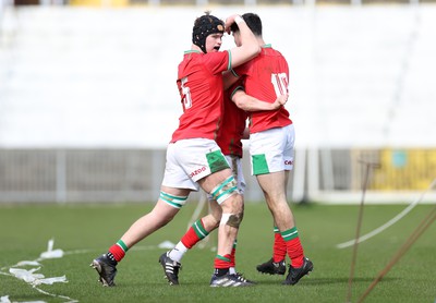 190323 - Wales U18s v Scotland U18s - Friendly - Thomas Bowen of Wales celebrates scoring a try with team mates