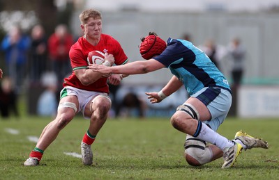 190323 - Wales U18s v Scotland U18s - Friendly - Harry Beddall of Wales is tackled by Matthew Urwin of Scotland 