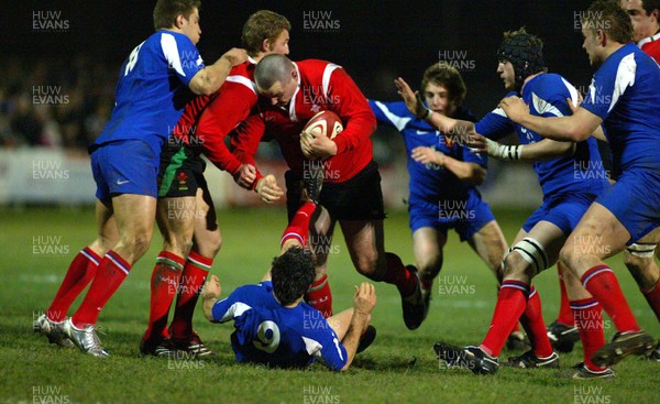 16.03.06...Wales U19 v France U19, Aberavon Wales' Kenneth Owens powers through Adrien Tomas 