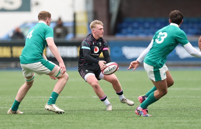 290326 - Wales U19 v Ireland U19 - Lloyd Lucas of Wales feeds the ball out