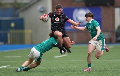 290326 - Wales U19 v Ireland U19 - Sam Morgan of Wales is tackled by Daniel O’Connell of Ireland and Ronan Kelly of Ireland