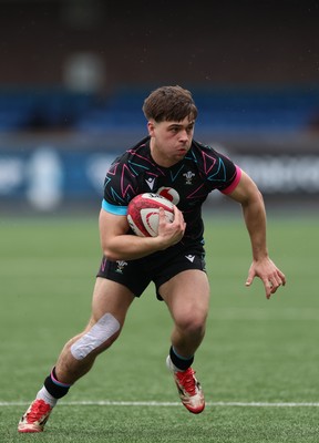 290326 - Wales U19 v Ireland U19 - Cai Gealy of Wales breaks away