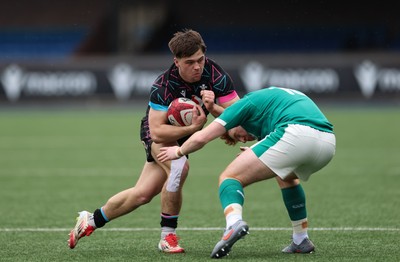 290326 - Wales U19 v Ireland U19 - Cai Gealy of Wales breaks away