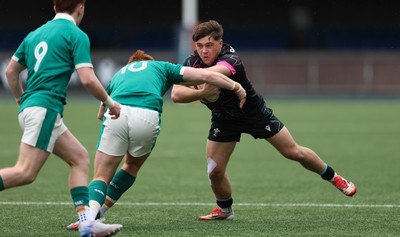 290326 - Wales U19 v Ireland U19 - Cai Gealy of Wales breaks away