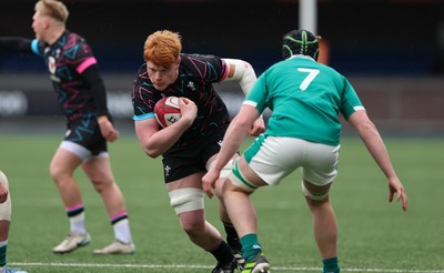 290326 - Wales U19 v Ireland U19 - Sonny McCabe of Wales takes on Jon Rodgers of Ireland
