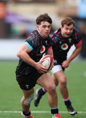 290326 - Wales U19 v Ireland U19 - Cai Gealy of Wales breaks away