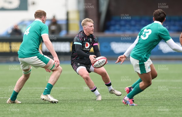 290326 - Wales U19 v Ireland U19 - Lloyd Lucas of Wales feeds the ball out