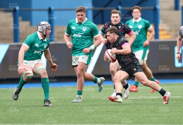 290326 - Wales U19 v Ireland U19 - Cai Gealy of Wales breaks away