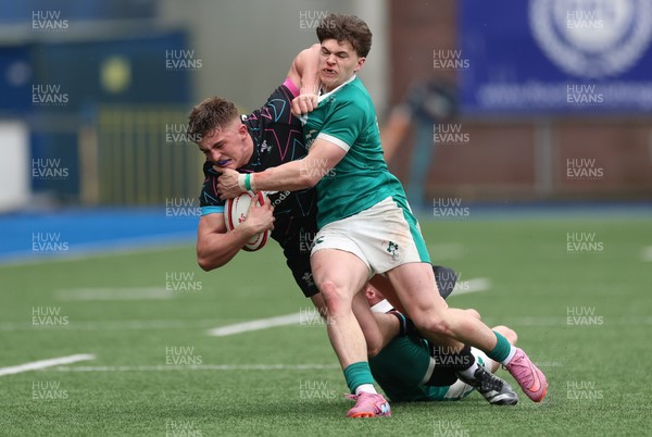 290326 - Wales U19 v Ireland U19 - Sam Morgan of Wales is tackled by Daniel O’Connell of Ireland and Ronan Kelly of Ireland