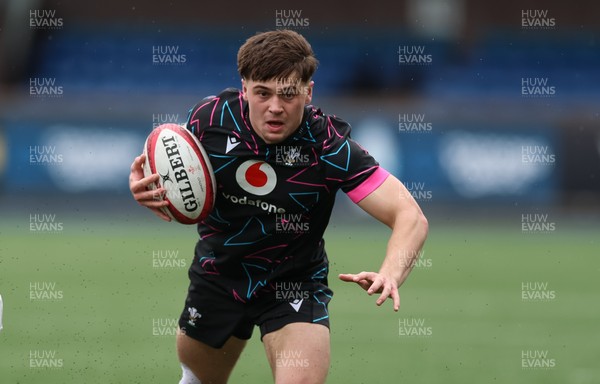 290326 - Wales U19 v Ireland U19 - Cai Gealy of Wales breaks away