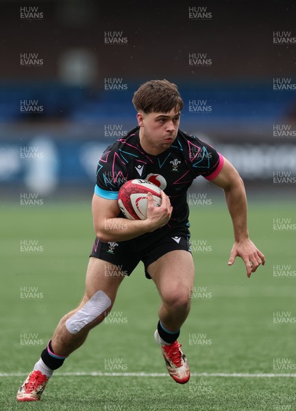 290326 - Wales U19 v Ireland U19 - Cai Gealy of Wales breaks away