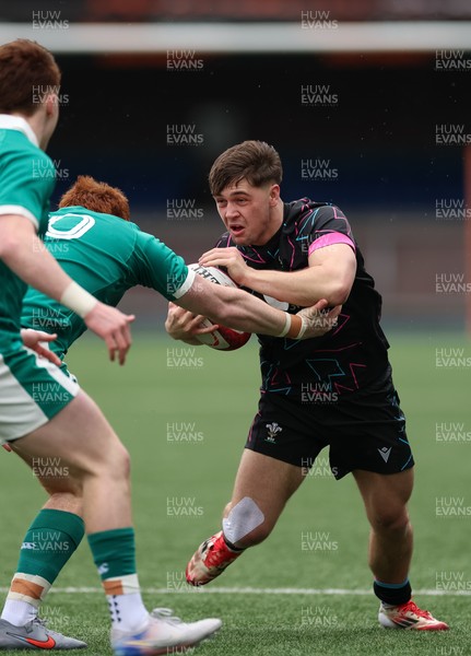 290326 - Wales U19 v Ireland U19 - Cai Gealy of Wales breaks away