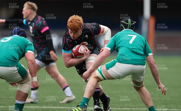 290326 - Wales U19 v Ireland U19 - Sonny McCabe of Wales takes on Jon Rodgers of Ireland