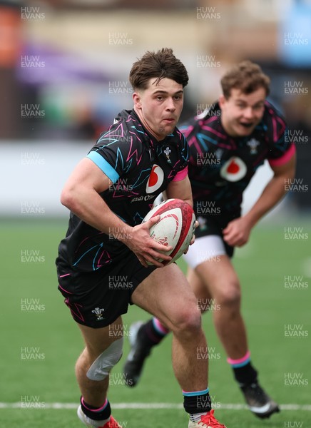 290326 - Wales U19 v Ireland U19 - Cai Gealy of Wales breaks away