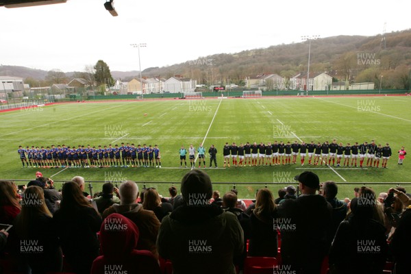 230319 - Wales U19 v Japan High Schools - Mid Season Friendly -  Players of Wales and Japan line up for the National Anthems 
