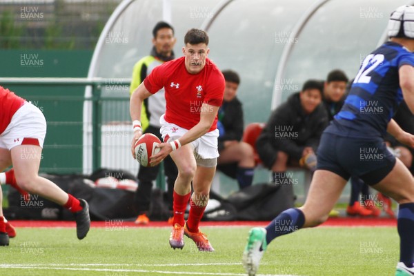 230319 - Wales U19 v Japan High Schools - Mid Season Friendly -  Ellis Bevan of Wales makes a break 