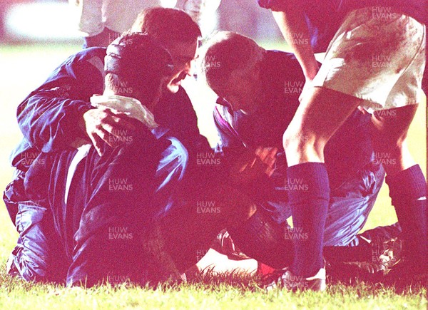 050196 - Wales Schools v Scotland Schools (Under 19s) - Peter Phillips is treated for injury in Bridgend