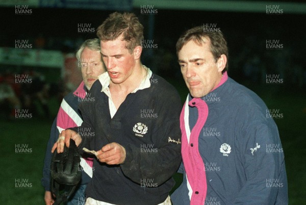 050196 - Wales Schools v Scotland Schools (Under 19s) - Peter Phillips leaves the field injured in Bridgend